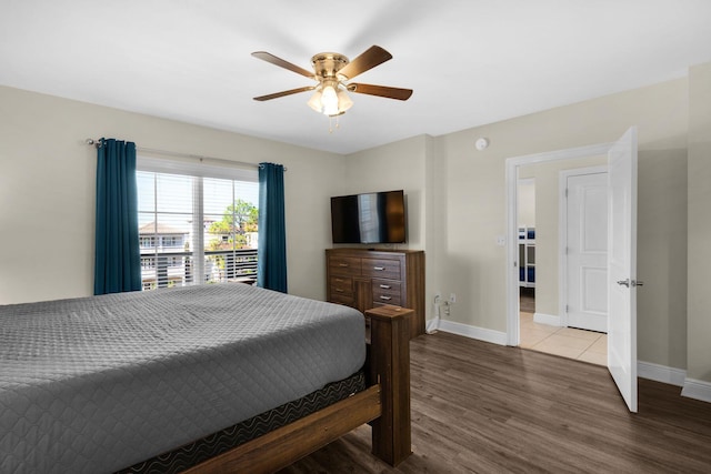 bedroom featuring wood-type flooring and ceiling fan