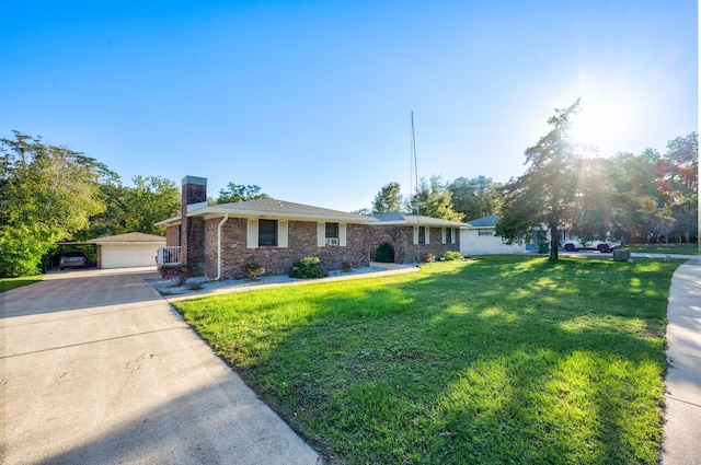 single story home featuring a front yard and a garage