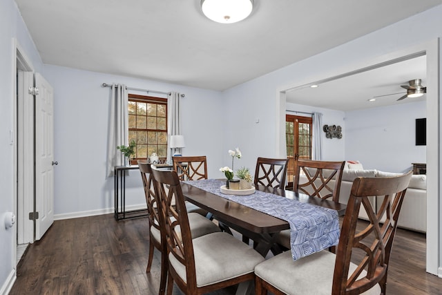 dining space with dark wood-type flooring, recessed lighting, and baseboards