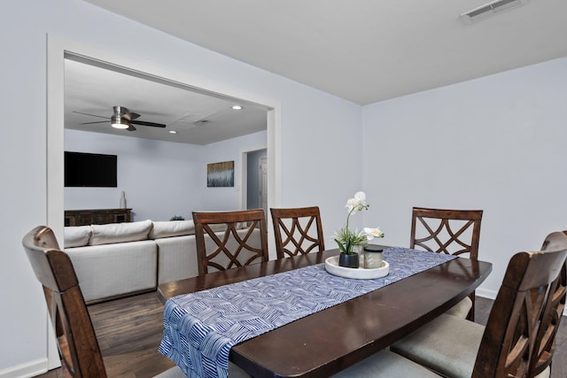 dining area with recessed lighting, dark wood-type flooring, a ceiling fan, baseboards, and visible vents