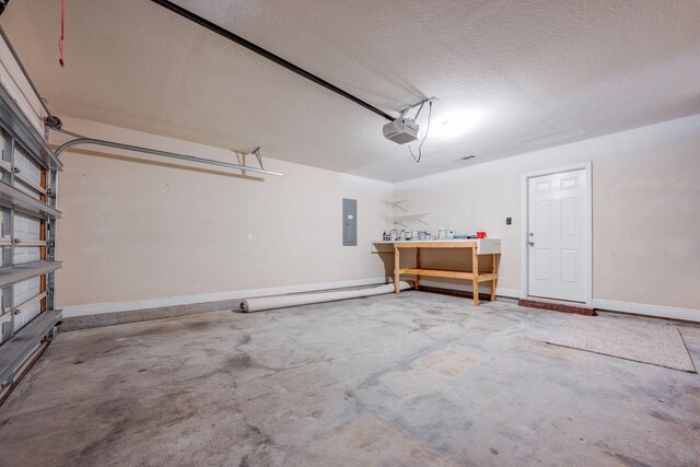 garage featuring a garage door opener and electric panel