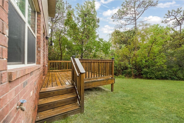 wooden deck with a yard