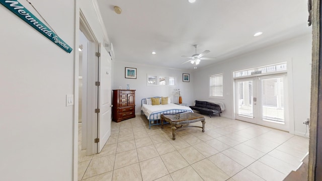 tiled bedroom with french doors, ceiling fan, crown molding, and access to exterior