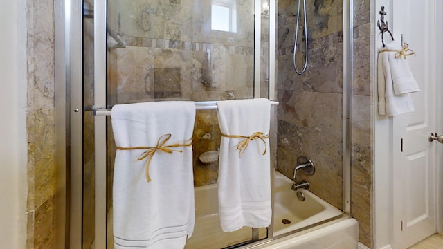 bathroom featuring enclosed tub / shower combo