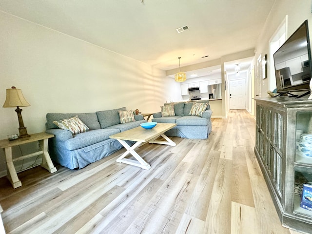 200 Sandestin Ln Unit 1307, Miramar Beach, FL 32550 - living room featuring light wood-type flooring
