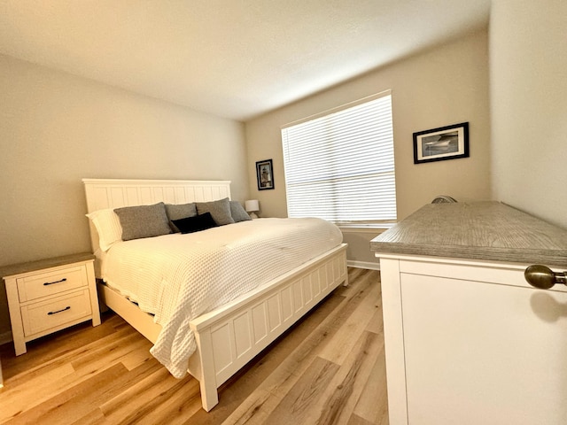 bedroom featuring light hardwood / wood-style floors