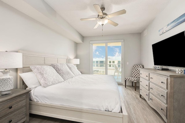 15928 Front Beach Rd Unit 3-409, Panama City Beach, FL 32413 - bedroom with light wood-type flooring, a ceiling fan, visible vents, and access to exterior