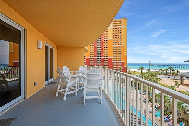 balcony featuring a water view