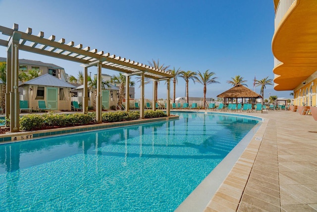 view of swimming pool featuring a gazebo and a pergola