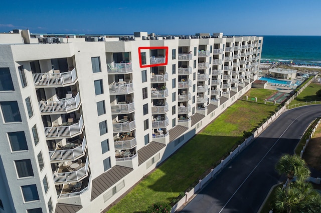 view of property with a water view