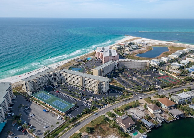 aerial view featuring a water view and a beach view