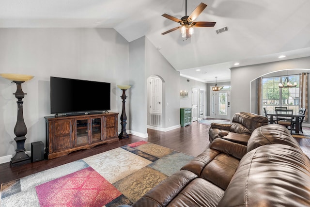 living room featuring high vaulted ceiling, dark hardwood / wood-style floors, and ceiling fan with notable chandelier