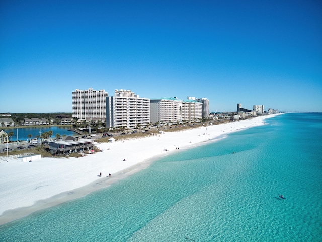 bird's eye view with a view of the beach and a water view