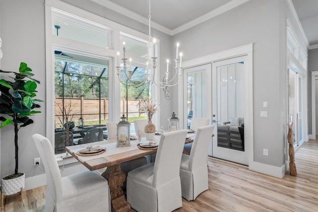 88 Beth Ln, Santa Rosa Beach, FL 32459 - dining room with light wood-type flooring, baseboards, and ornamental molding