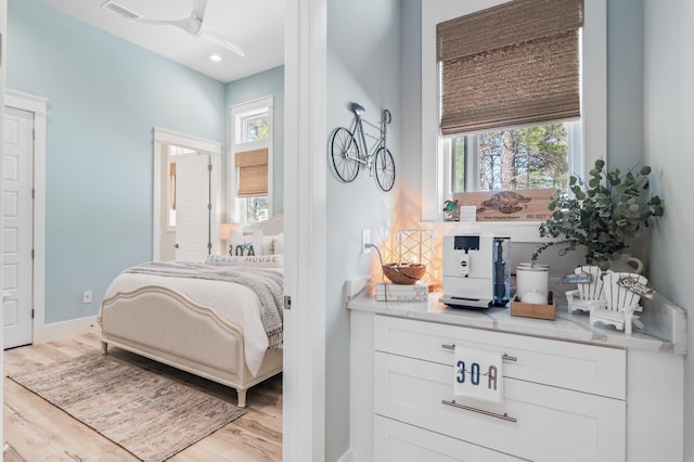 88 Beth Ln, Santa Rosa Beach, FL 32459 - bedroom featuring multiple windows, light wood-style floors, visible vents, and baseboards