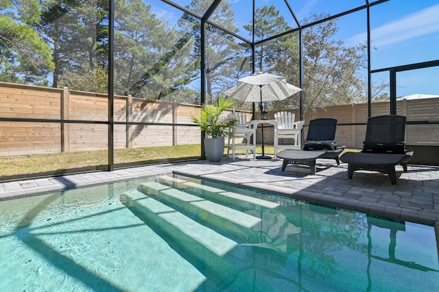 88 Beth Ln, Santa Rosa Beach, FL 32459 - view of pool with a lanai, a patio area, a fenced in pool, and a fenced backyard