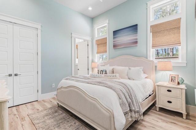 88 Beth Ln, Santa Rosa Beach, FL 32459 - bedroom featuring light wood finished floors, recessed lighting, a closet, and baseboards
