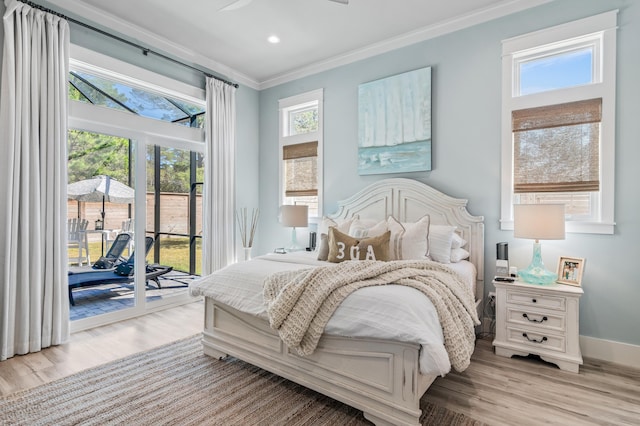 88 Beth Ln, Santa Rosa Beach, FL 32459 - bedroom with access to exterior, wood finished floors, baseboards, and ornamental molding