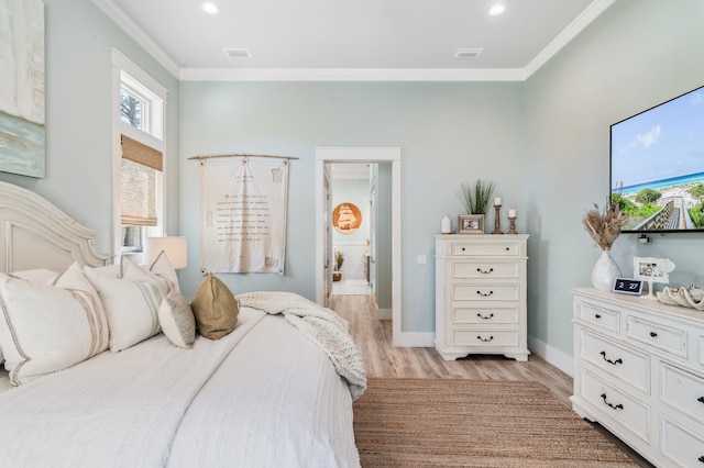 88 Beth Ln, Santa Rosa Beach, FL 32459 - bedroom with visible vents, recessed lighting, light wood-style floors, crown molding, and baseboards