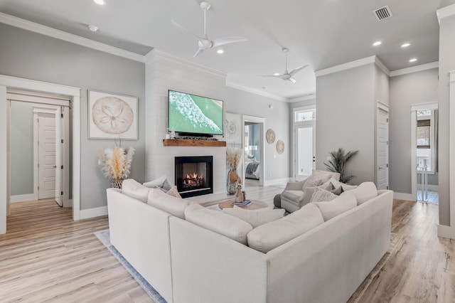 88 Beth Ln, Santa Rosa Beach, FL 32459 - living room with light wood finished floors, plenty of natural light, and ceiling fan