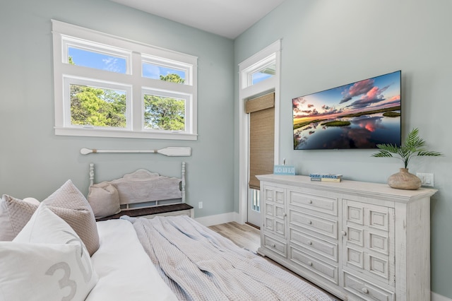88 Beth Ln, Santa Rosa Beach, FL 32459 - bedroom featuring light wood finished floors and baseboards