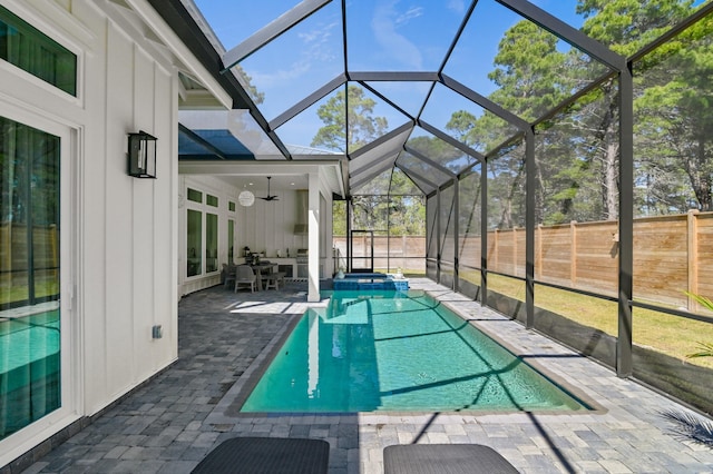 88 Beth Ln, Santa Rosa Beach, FL 32459 - view of pool featuring a ceiling fan, a patio, a fenced backyard, and a pool with connected hot tub