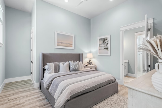 88 Beth Ln, Santa Rosa Beach, FL 32459 - bedroom with recessed lighting, light wood-style flooring, ensuite bathroom, and baseboards