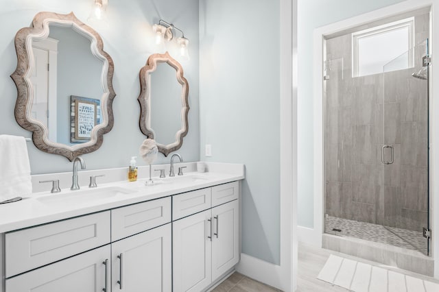 88 Beth Ln, Santa Rosa Beach, FL 32459 - full bath featuring tile patterned flooring, a shower stall, double vanity, and a sink