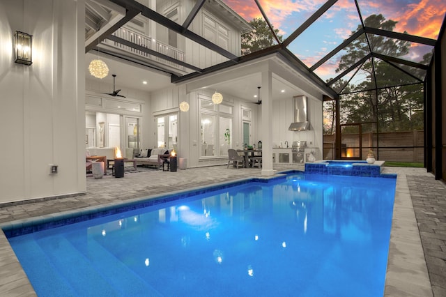 88 Beth Ln, Santa Rosa Beach, FL 32459 - view of pool with ceiling fan, an outdoor hangout area, glass enclosure, and a patio