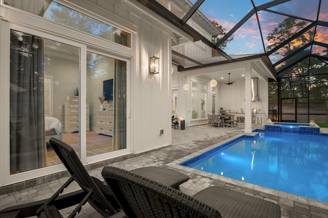 88 Beth Ln, Santa Rosa Beach, FL 32459 - view of swimming pool with a lanai, a patio area, a pool with connected hot tub, and ceiling fan