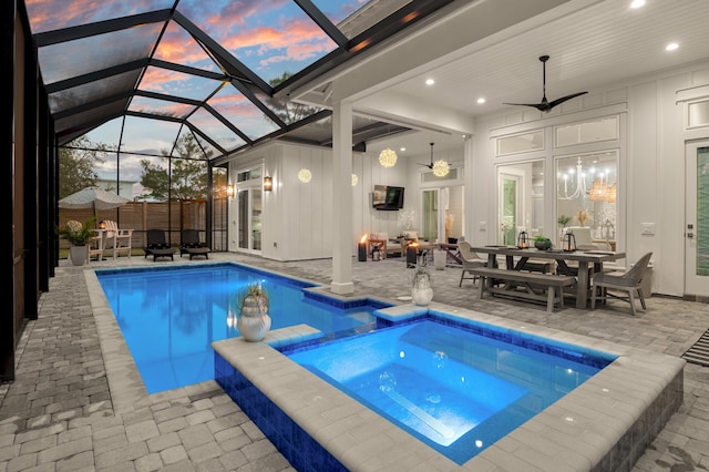 88 Beth Ln, Santa Rosa Beach, FL 32459 - view of swimming pool with a patio area, a pool with connected hot tub, outdoor dining area, and ceiling fan