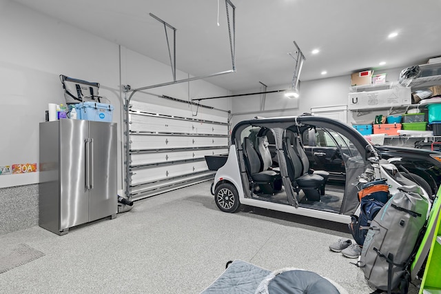 88 Beth Ln, Santa Rosa Beach, FL 32459 - garage featuring recessed lighting and high quality fridge