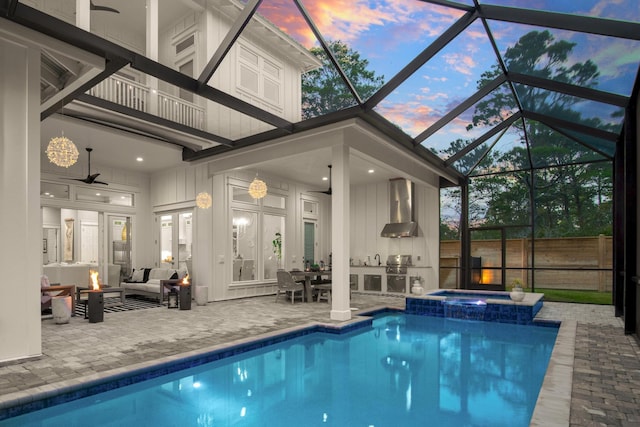88 Beth Ln, Santa Rosa Beach, FL 32459 - pool at dusk with a patio, an outdoor living space, area for grilling, a pool with connected hot tub, and ceiling fan