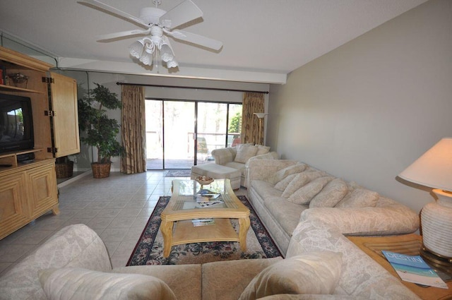 tiled living room featuring ceiling fan