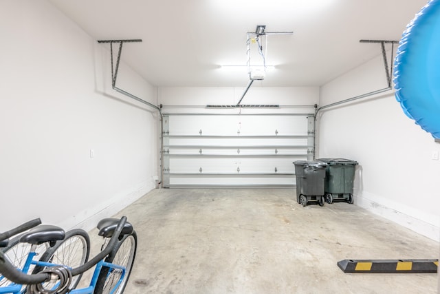 garage featuring a garage door opener