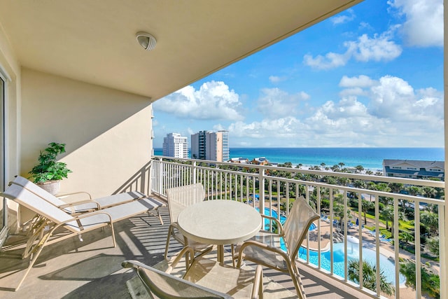 balcony featuring a water view