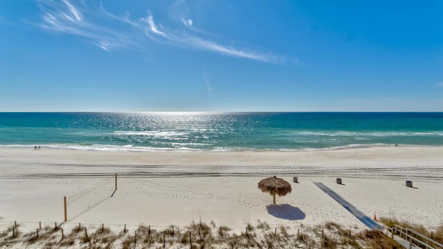 view of water feature with a beach view