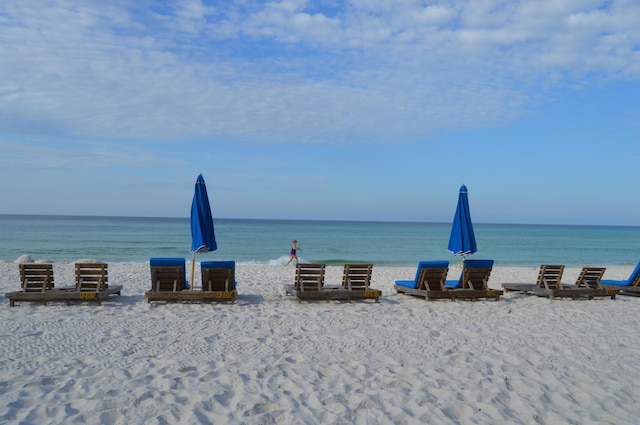 view of water feature with a beach view