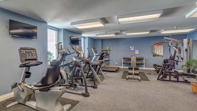 exercise room with carpet floors