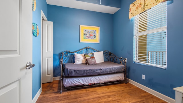 bedroom featuring hardwood / wood-style floors