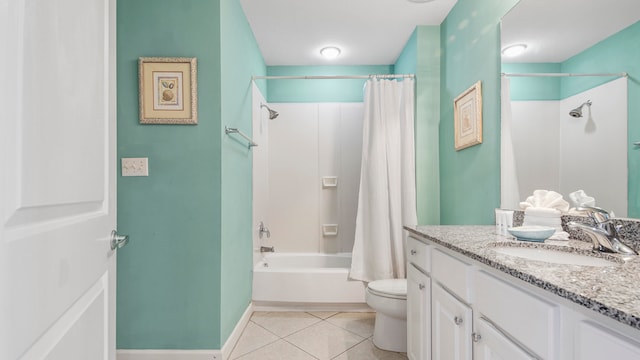 full bathroom with vanity, toilet, shower / bath combo with shower curtain, and tile patterned flooring