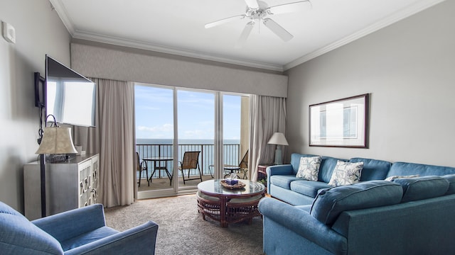 carpeted living room featuring ornamental molding and ceiling fan