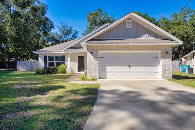 view of front facade featuring a garage and a front lawn