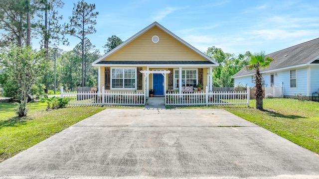 bungalow-style home featuring a front yard and a porch