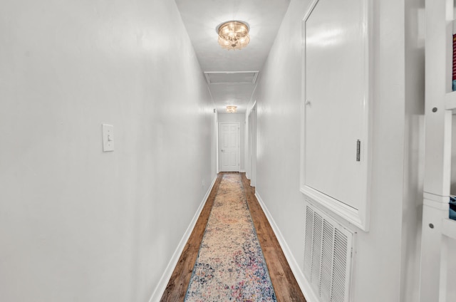 hall featuring dark wood-type flooring