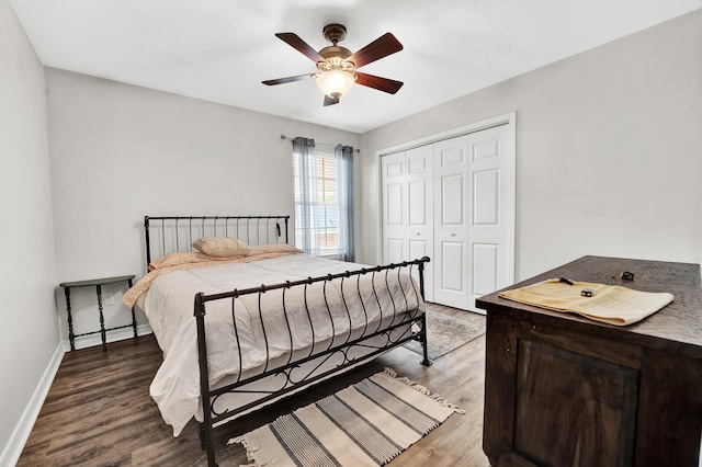 bedroom with a closet, wood-type flooring, and ceiling fan