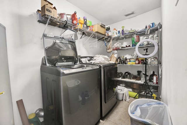 laundry room with washing machine and dryer