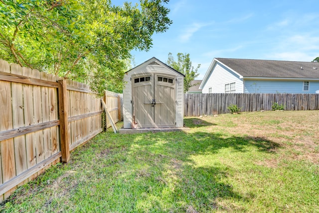 view of outbuilding featuring a lawn