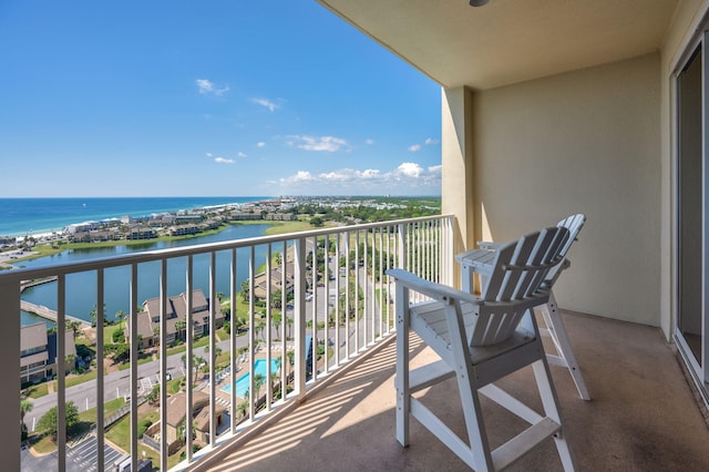 balcony featuring a water view