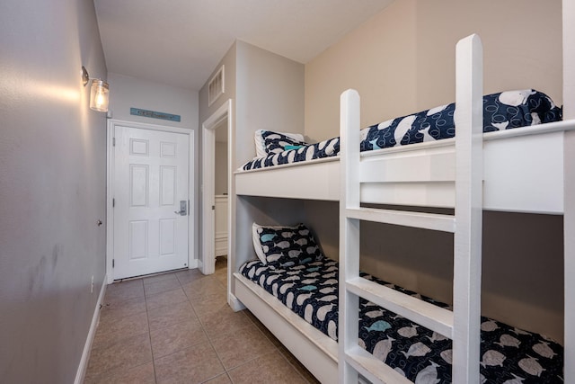 bedroom with tile patterned flooring